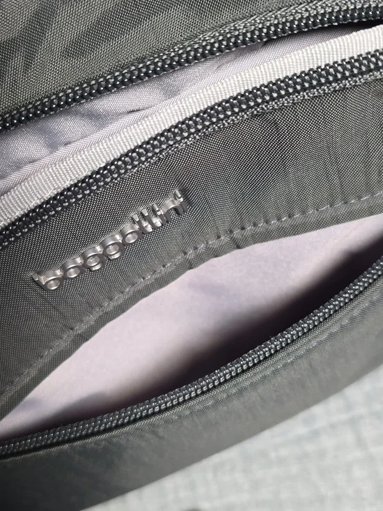 Baggallini Black Lightweight Crossbody Messenger Bag with 5 zipper compartments. - Picture 5 of 11